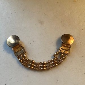 Goldtone sweater guard
